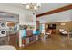 Open-concept living area featuring vintage furniture, unique decor, and seamless flow to adjacent spaces at 421 N Evergreen St, Chandler, AZ 85225