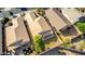 An aerial view of a well maintained single-Gathering home with a tile roof and desert landscaping at 4251 E Sundance Ave, Gilbert, AZ 85297