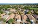 An aerial view showcases the neighborhood's well-maintained homes, lush landscaping, and serene atmosphere at 4251 E Sundance Ave, Gilbert, AZ 85297