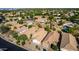 An aerial view of neighborhood homes, landscaped yards, and tree-lined streets at 4251 E Sundance Ave, Gilbert, AZ 85297