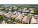 An aerial view showcases a well maintained single-Gathering home in a quiet residential neighborhood at 4251 E Sundance Ave, Gilbert, AZ 85297
