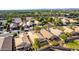 Aerial view features a single-Gathering home with a landscaped backyard in a quiet neighborhood at 4251 E Sundance Ave, Gilbert, AZ 85297