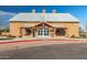 A front-facing view of the barn building with glass doors and outdoor benches at 4251 E Sundance Ave, Gilbert, AZ 85297
