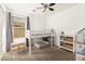 Bright bedroom featuring a bunk bed with baskets and toys at 4251 E Sundance Ave, Gilbert, AZ 85297