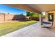 Large covered patio and landscaped backyard for entertainment and outdoor enjoyment at 4251 E Sundance Ave, Gilbert, AZ 85297