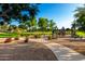 Community playground with modern play equipment and landscaped surroundings for Gathering enjoyment at 4251 E Sundance Ave, Gilbert, AZ 85297