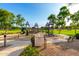 Community playground with modern play equipment and landscaped surroundings for Gathering enjoyment at 4251 E Sundance Ave, Gilbert, AZ 85297