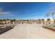 A pond with walking path, lake, and bridge on a clear, sunny day at 4251 E Sundance Ave, Gilbert, AZ 85297