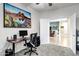 Convenient home office with direct access to a cozy, carpeted living room at 42711 W Darter Dr, Maricopa, AZ 85138