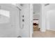 Bright bathroom with a white marble shower stall, tile floors, and a glimpse of the bedroom at 4301 E Abraham Ln, Phoenix, AZ 85050