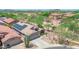 Charming single-story home featuring solar panels, a two-car garage, and desert landscaping at 4301 E Abraham Ln, Phoenix, AZ 85050