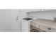 Well-lit laundry room featuring new, front-loading washer and dryer units at 4301 E Abraham Ln, Phoenix, AZ 85050