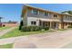 Charming two-story townhome featuring a well-maintained lawn and inviting entryway in a desirable neighborhood at 4629 S Mill Ave, Tempe, AZ 85282