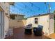 Relaxing patio area with comfortable seating, modern flooring and string lights for evening enjoyment at 4629 S Mill Ave, Tempe, AZ 85282