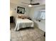 Bedroom with neutral bedding, ceiling fan, and a built-in windowsill at 4743 W Alice Ave, Glendale, AZ 85302