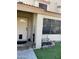 Inviting front entrance featuring a cream door with a half moon window and a small pet door at 4743 W Alice Ave, Glendale, AZ 85302