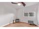 Spare bedroom with hardwood floors and a window, complete with guitar and music equipment, ready for use at 5210 W Jupiter N Way, Chandler, AZ 85226