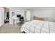 A bedroom that contains a bed, desk, closet, drawers, and carpet flooring with natural lighting at 5542 W Big Oak St, Phoenix, AZ 85083