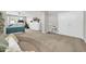 Large bedroom with sitting area, ensuite home gym and neutral carpet at 5542 W Big Oak St, Phoenix, AZ 85083