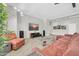 Cozy living room with a sectional sofa, entertainment center, and stylish decor at 5542 W Big Oak St, Phoenix, AZ 85083