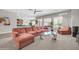 Inviting living room with a comfortable sectional sofa, modern coffee table, and open layout at 5542 W Big Oak St, Phoenix, AZ 85083