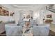 Open living room with seating area, dining room, staircase and views throughout at 5542 W Big Oak St, Phoenix, AZ 85083