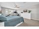 Bright bedroom featuring a home gym, plantation shutters, and neutral tones at 5542 W Big Oak St, Phoenix, AZ 85083