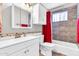 Clean bathroom with white vanity and tiled shower at 6055 E Hannibal St, Mesa, AZ 85205