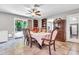 Cozy dining area includes a charming table, backyard access, and a built-in cabinet at 6055 E Hannibal St, Mesa, AZ 85205