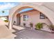 Arched entryway to single-story home featuring desert landscaping at 6055 E Hannibal St, Mesa, AZ 85205