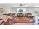 Inviting living room with neutral walls, tile floors, and comfortable seating at 6055 E Hannibal St, Mesa, AZ 85205