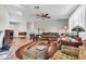 Spacious living room featuring neutral walls, tiled floor, and oval rug at 6055 E Hannibal St, Mesa, AZ 85205