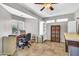 Office features tiled floors, a window, and ample desk space at 6055 E Hannibal St, Mesa, AZ 85205