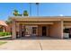 Spacious carport with assigned parking, mature landscaping and nearby walkways at 611 E Colgate Dr, Tempe, AZ 85283