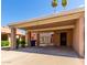 Carport with covered parking featuring unit number, adjacent landscaping, and neutral colors at 611 E Colgate Dr, Tempe, AZ 85283