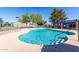 Community pool with -safe access, shaded seating, and well-maintained landscaping at 611 E Colgate Dr, Tempe, AZ 85283