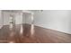 Bright living room featuring hard surface flooring and a modern open floorplan at 611 E Colgate Dr, Tempe, AZ 85283