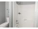 Bright bathroom featuring a white shower and tub combo with modern fixtures at 611 E Colgate Dr, Tempe, AZ 85283