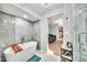 Luxurious bathroom features a soaking tub and modern finishes at 6215 E Surrey Ave, Scottsdale, AZ 85254