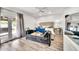 Cozy bedroom featuring soft colors, a decorative bench, and natural light at 6215 E Surrey Ave, Scottsdale, AZ 85254