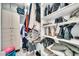 Organized walk-in closet with ample hanging and shelf space at 6215 E Surrey Ave, Scottsdale, AZ 85254