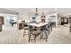 Spacious kitchen features a large center island with seating and modern stainless steel appliances at 6215 E Surrey Ave, Scottsdale, AZ 85254