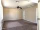 Expansive bedroom with neutral color palette, a ceiling fan, and ample space for furnishings at 6388 W Ruth Ave, Glendale, AZ 85302