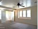 Large bedroom featuring lots of windows for natural light, a ceiling fan, and ample closet space at 6388 W Ruth Ave, Glendale, AZ 85302