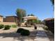 Community playground with play equipment, covered seating, and surrounding landscaping at 6388 W Ruth Ave, Glendale, AZ 85302