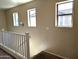 Brightly lit staircase showcasing multiple windows, offering plentiful natural light and an airy feel at 6388 W Ruth Ave, Glendale, AZ 85302