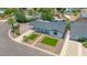 Aerial view of single-story home featuring well-maintained yard and covered parking at 6908 E Windsor Ave, Scottsdale, AZ 85257