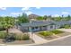 Aerial view of the single-story home with a well-maintained front yard and a mature palm tree at 6908 E Windsor Ave, Scottsdale, AZ 85257
