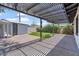 Backyard features a covered patio and artificial grass at 6908 E Windsor Ave, Scottsdale, AZ 85257