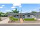 Beautiful single-story home with manicured front yard landscaping, artificial lawns at 6908 E Windsor Ave, Scottsdale, AZ 85257